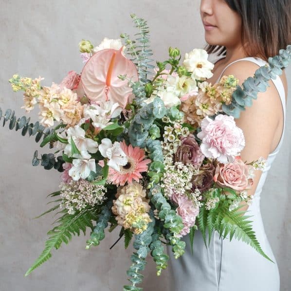 peach and blush pink flower bouquet garden style
