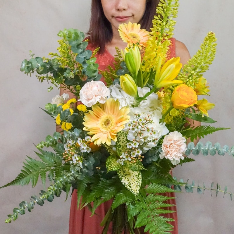 yellow flower bouquet garden style