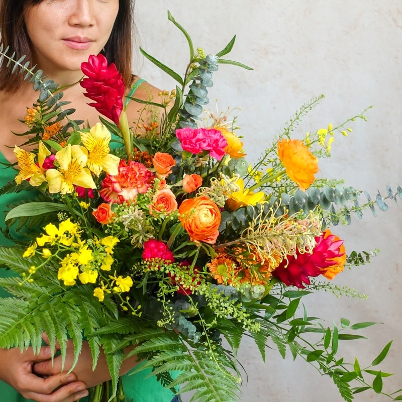 tropical colours flower bouquet garden style close up