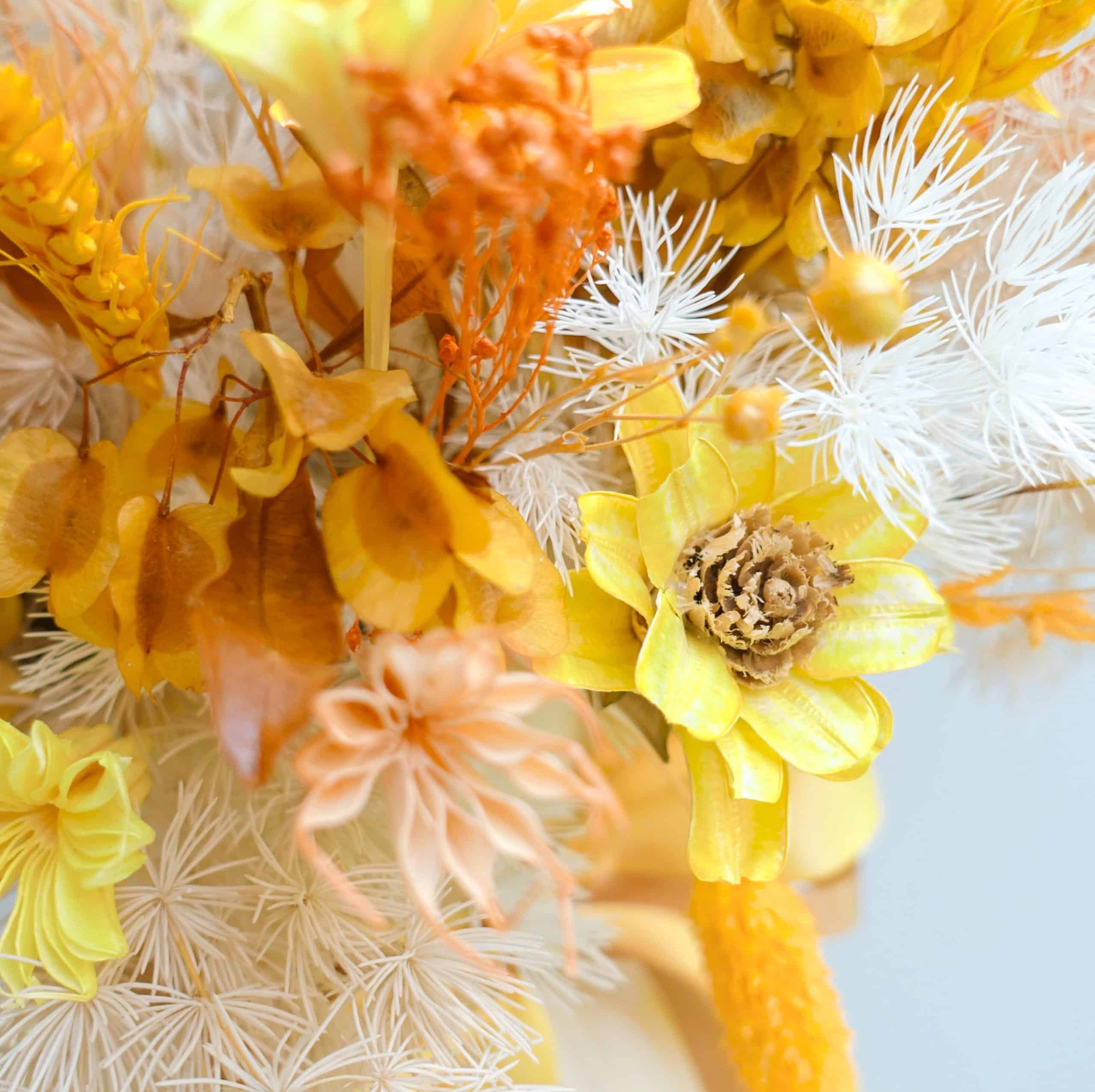 yellow orange beige vase arrangement close up 02