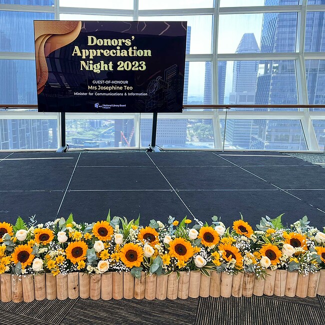 Sunflower floral arrangement for event decor.