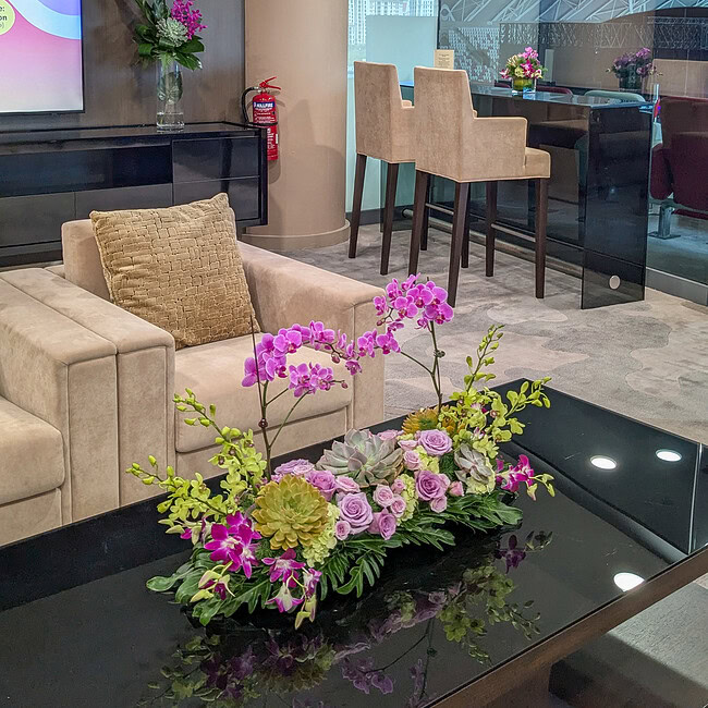 Elegant floral arrangement in modern studio setting.