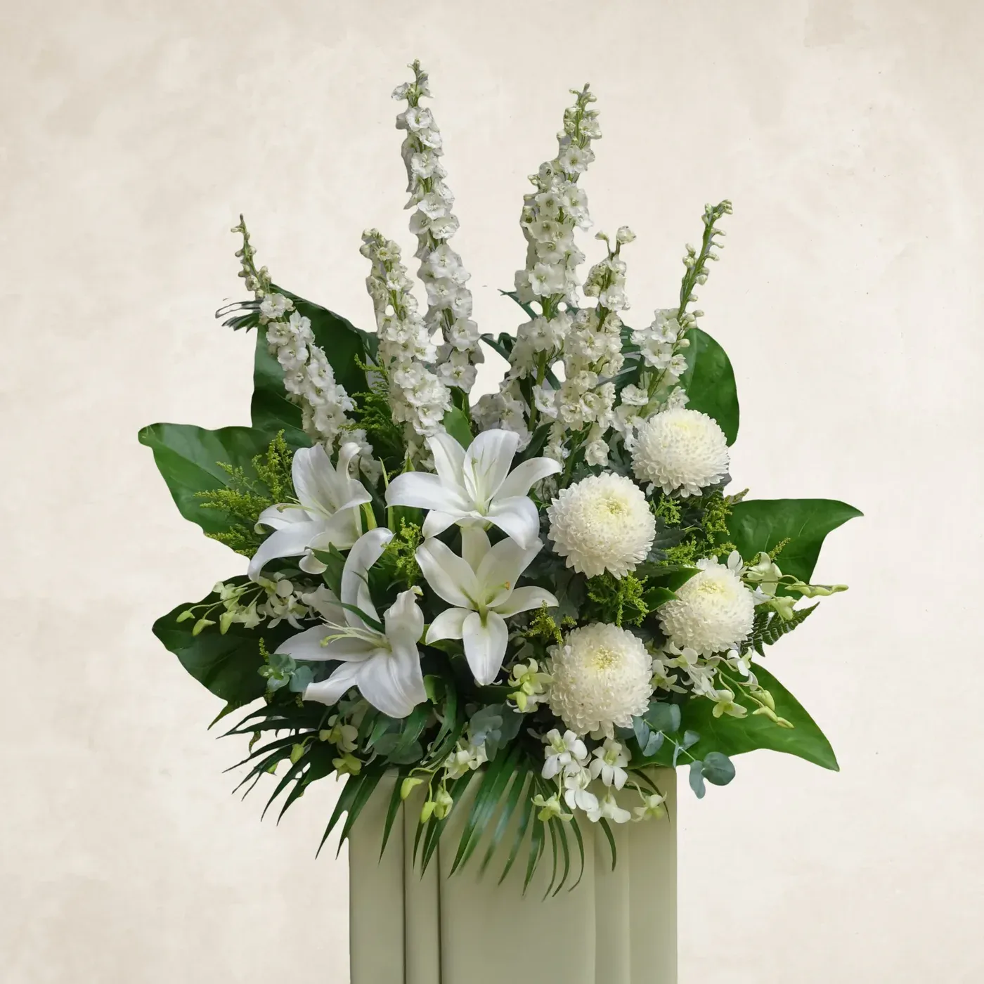 Elegant white floral arrangement for peaceful moments.
